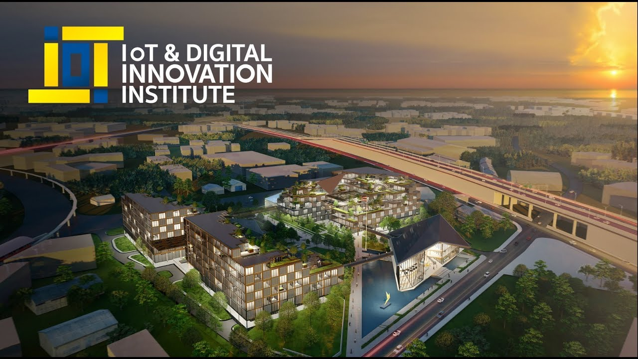 Reference rendering of the IoT and Digital Innovation Institute campus, with stepped buildings, a pitched-roof hall, gardens, water and elevated transit.